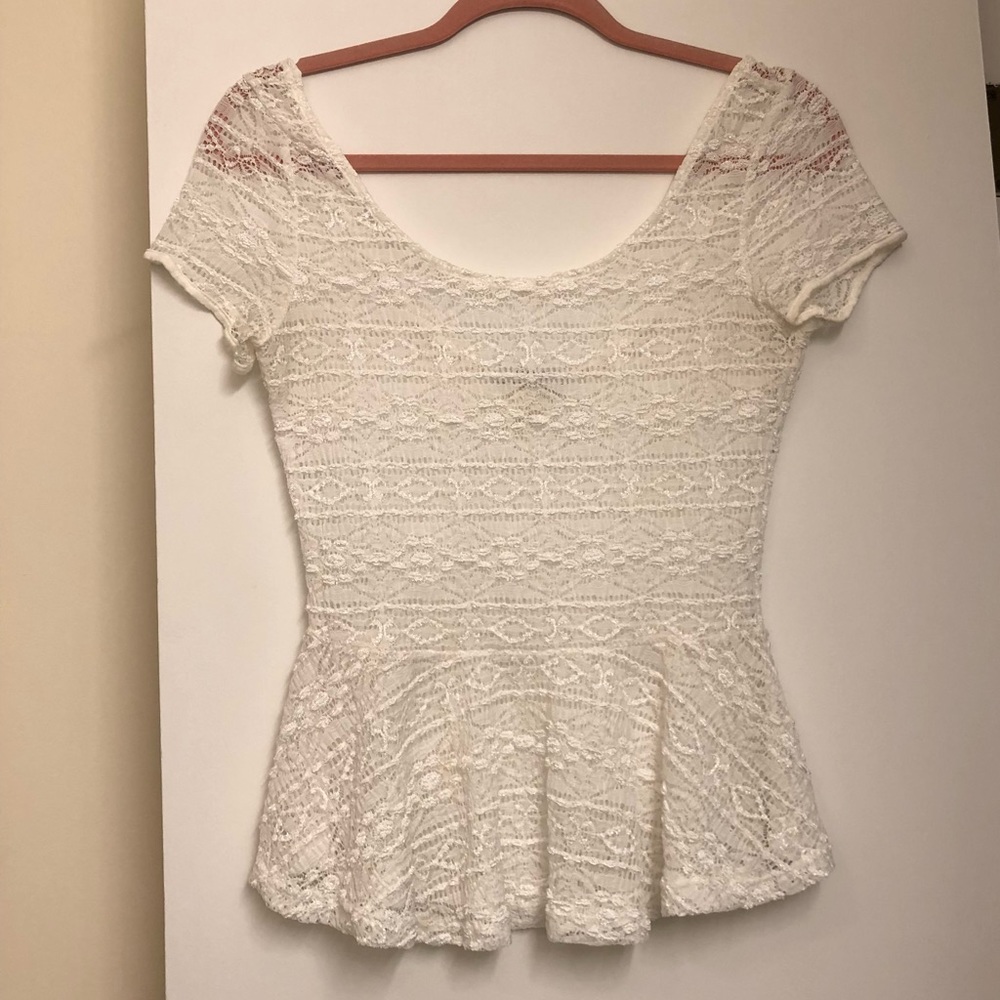 Delia’s white lace peplum top